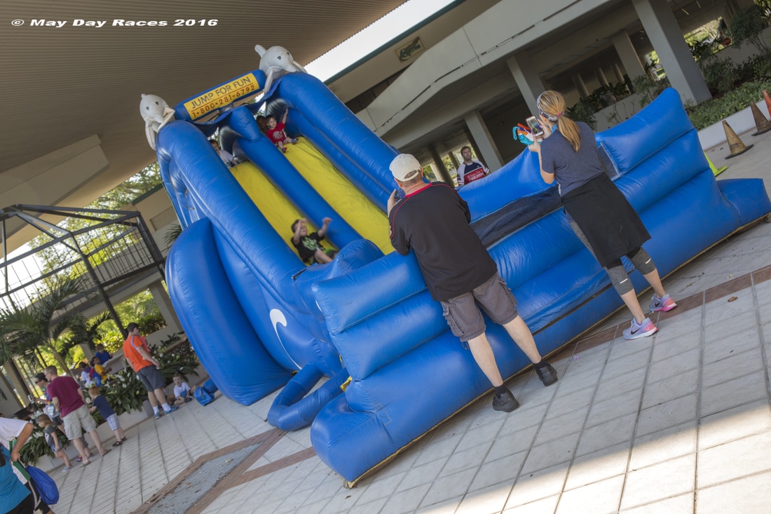 May Day Races and Festival activity included a slide for kids.