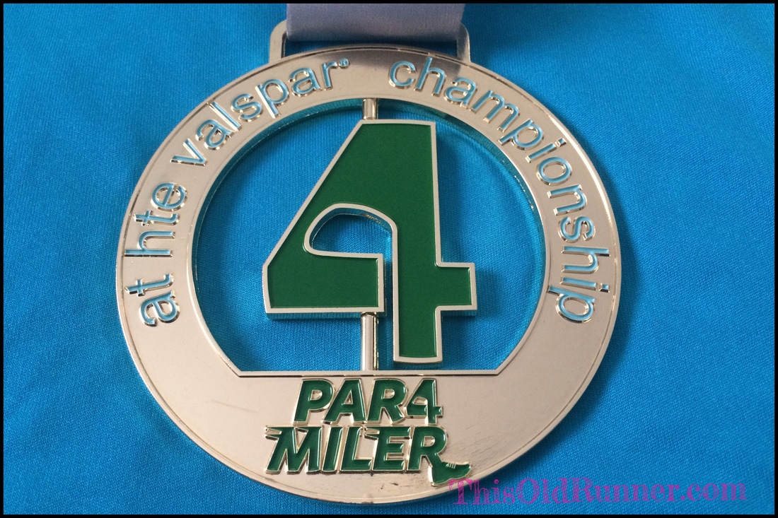The finisher medal for the Par4Miler race.