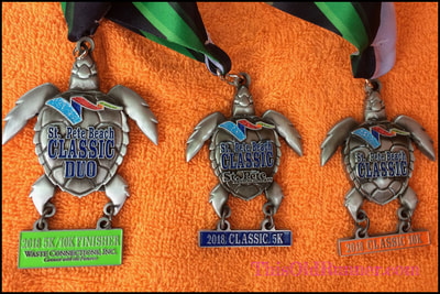 Three turtle medals from the St Pete Beach Classic Challenge