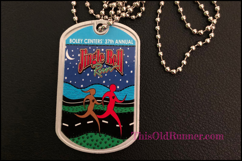 2019 medal for the Boley Centers Jingle Bell Run in downtown St. Pete, FL