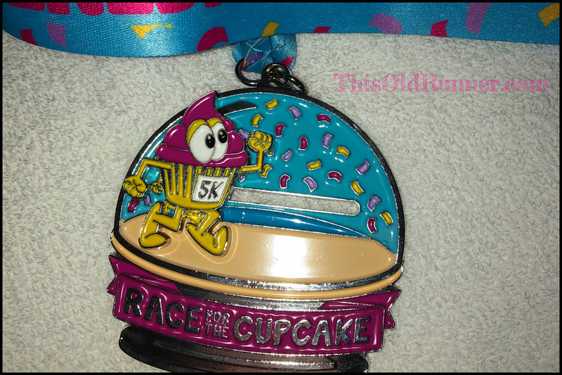 2020 Race for the Cupcake 5K medal featuring moving cupcake.