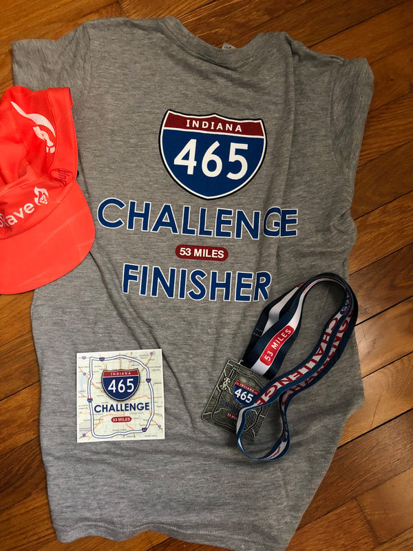 The inaugural 465 Challenge premium swag includes a shirt, medal and bumper sticker.