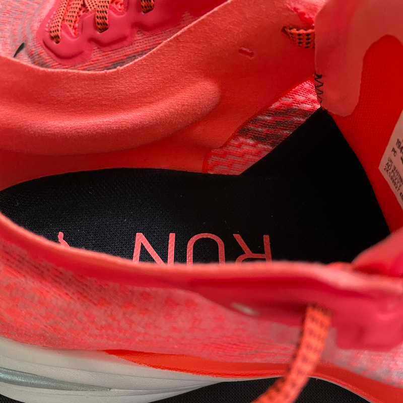 Closeup look inside the Puma Deviate Nitro running shoe near the heel.