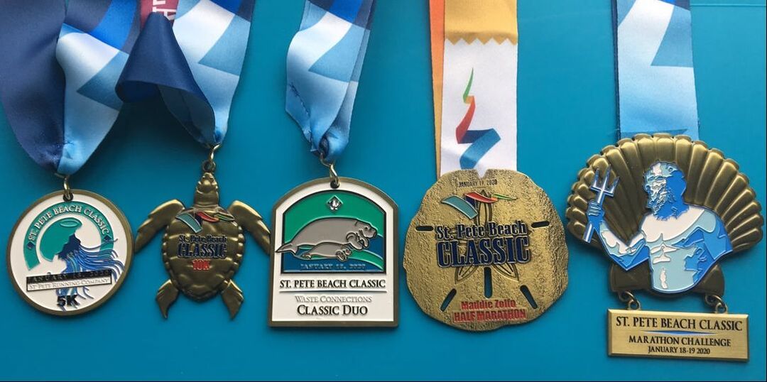 St Pete Beach Classic 2020 Medals for the 5k, 10k, Duo, Half, and Marathon Challenge.