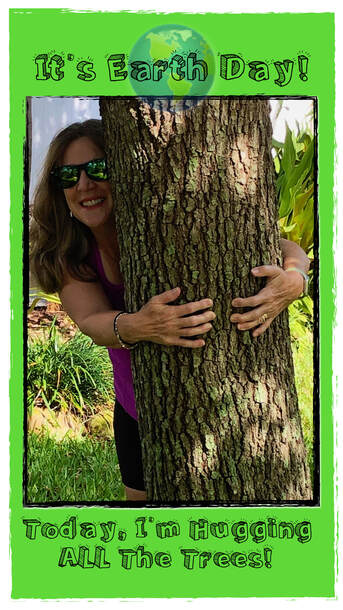 Woman hugging a tree on Earth Day while wearing Knockaround Sunglasses.