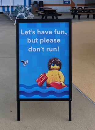 Sing in the Legoland waterpark asks visitors not to run.