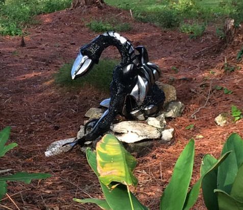 #seenonarun Sculpture of a dragon by Paul Eppling at Boyd Hill Nature Preserve in St. Petersburg, FL.
