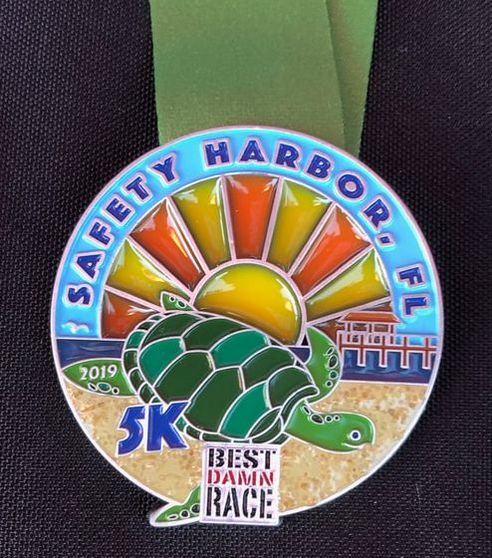 Stained glass 5K medal for Best Damn Race