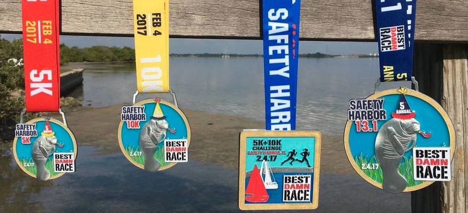 Picture of 2017 Best Damn Race Safety Harbor race medals.