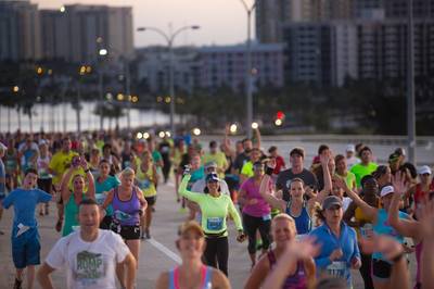 Runners in First Watch Sarasota Half Marathon on Ringling Bridge.