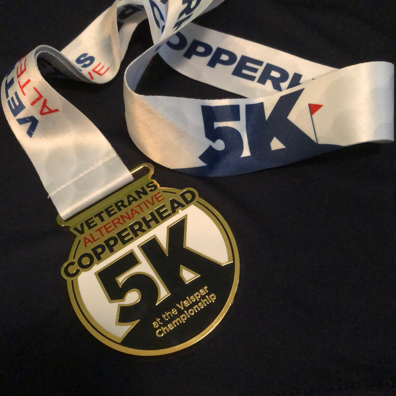 2019 medals from the Valspar Copperhead 5K race
