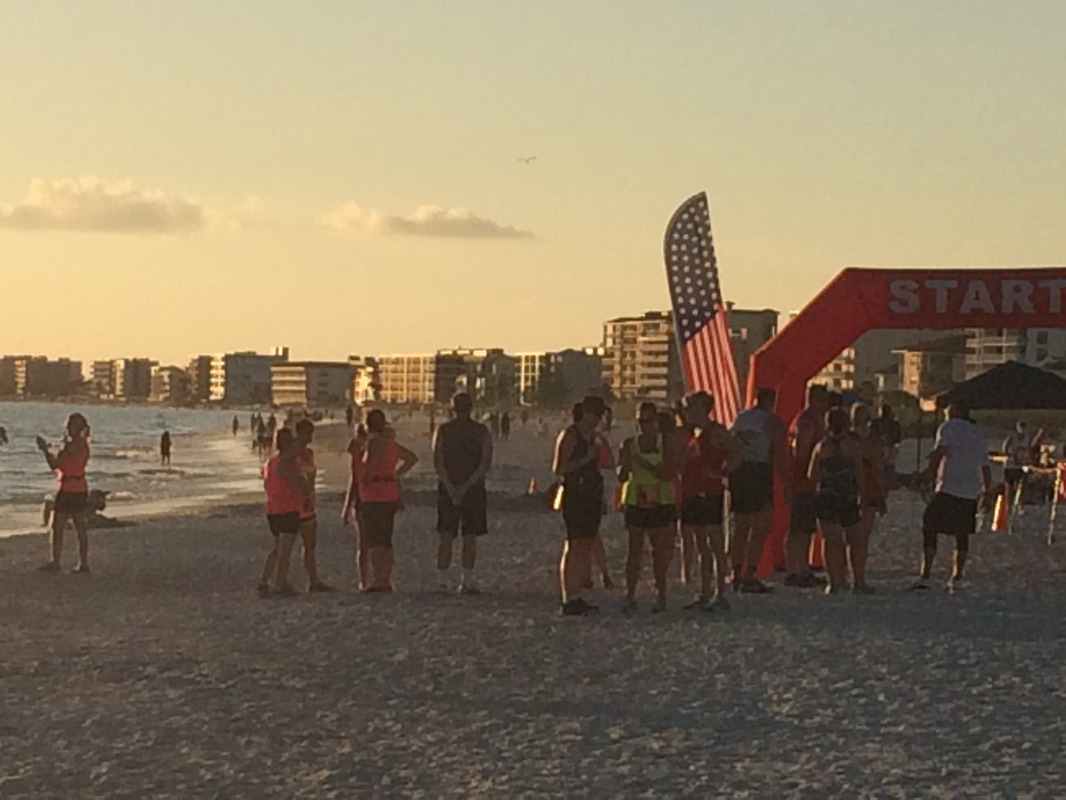 Runners at the finish line of the Madeira Beach Sunset 5K race.