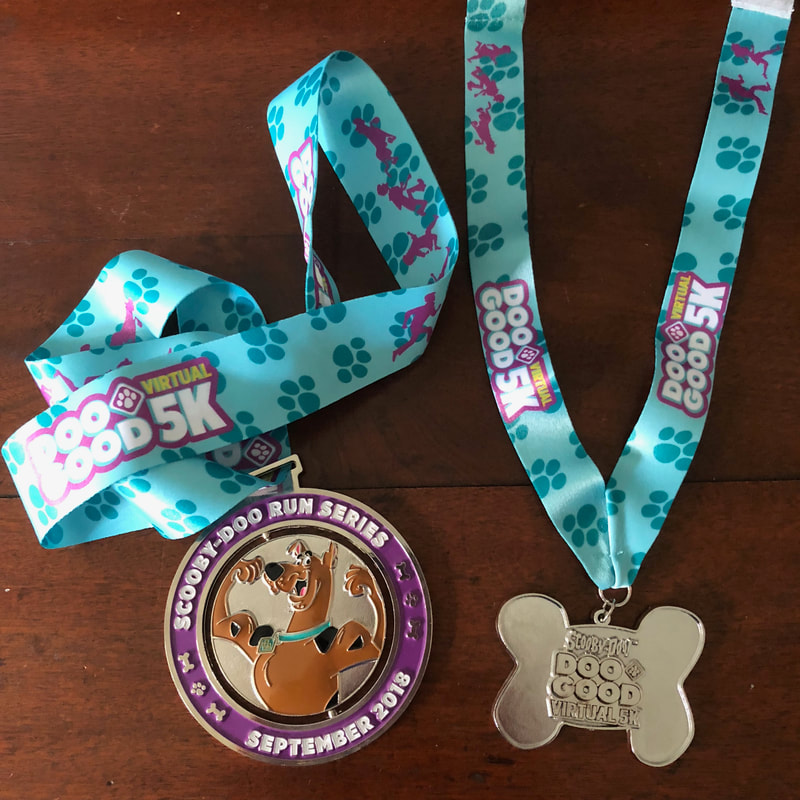 Scooby DooGood 5K race medals.