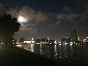 The moon over St. Petersburg waterfront.