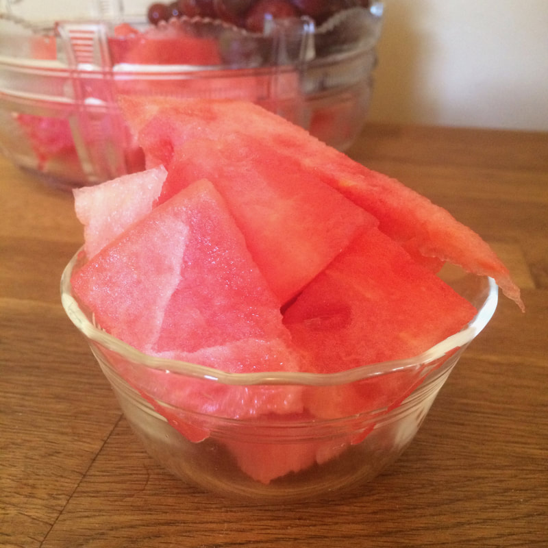 Fresh watermelon in a glass cup.