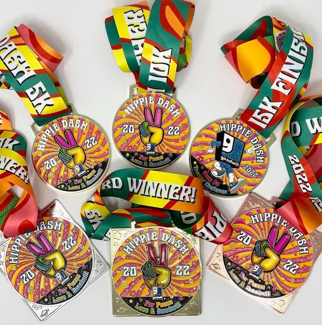 Photo of 2022 Hippie Dash finisher medals for 5k, 10k and challenge events.