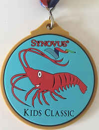 Medal for the kids race at the St Pete Beach Classic.