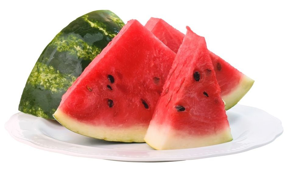 Sliced watermelon on a dish.