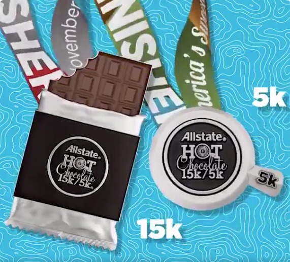 15K and 5K medals for the Hot Chocolate races are shaped like a chocolate bar and a cup of hot chocolate.