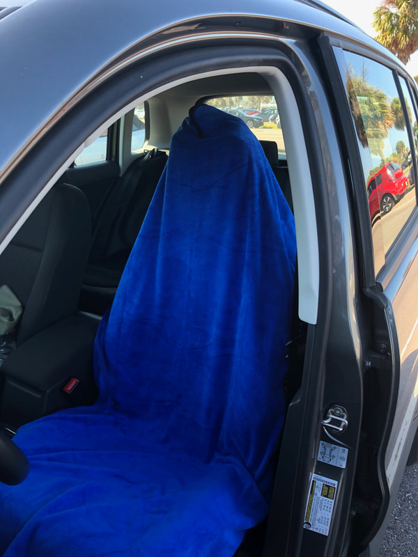 Orange Mud transition wrap used as a car seat cover.