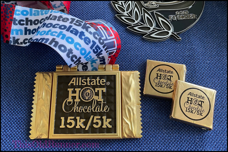Front of Hot Chocolate Races 15K and 5K Finisher Medal.
