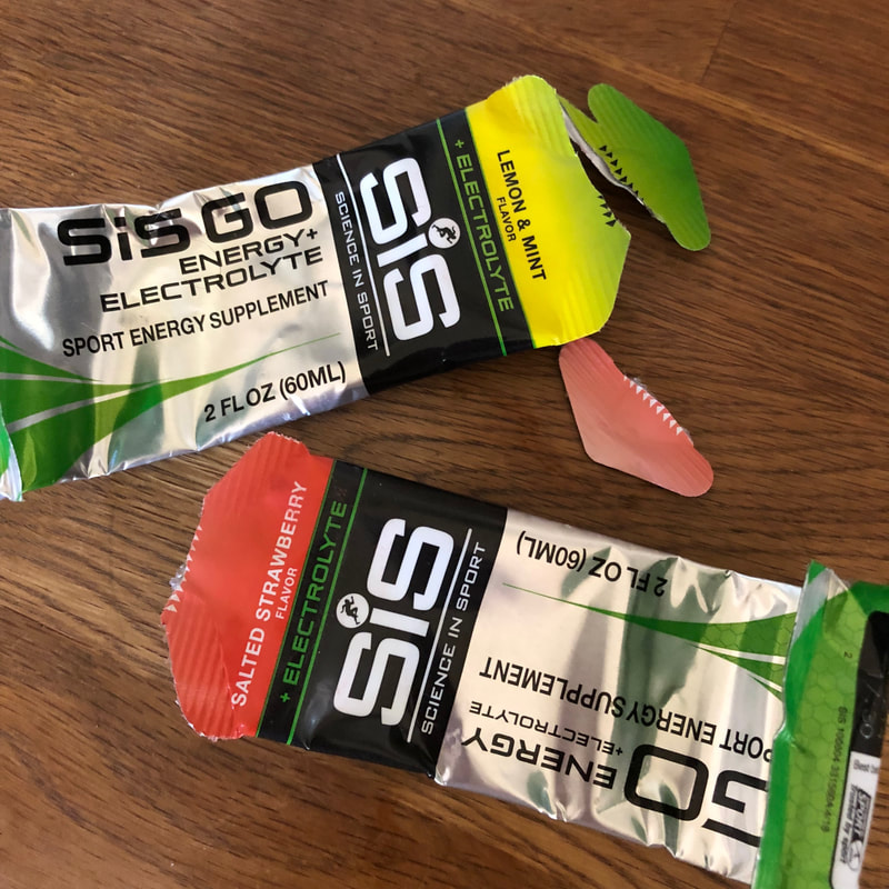 Lemon and Strawberry Science in Sport gels.